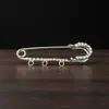 Hebilla anti-luz, aguja, anillo de diamantes de imitación, alfiler grande, venta al por mayor, hebilla de seguridad, pantalones, falda, cambio de cintura, alfiler, artefacto de cintura para damas