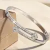 Pulsera de acero de titanio, no se decolora, doble trébol de cuatro hojas, 18k, redonda estrellada, totalmente de diamantes, versátil, de alta gama, elegante y simple