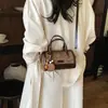 Bolso de mano de alta gama para mujer, nuevo bolso de hombro de moda para verano 2026, bolso cruzado tipo almohada versátil