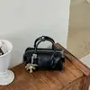 Bolso de mano de moda transfronterizo, bolso tote pequeño para mujer, nuevo modelo otoño 2026, color liso simple, versátil y texturizado, bolso de hombro y cruzado