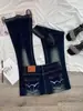 Jeans Azules Oscuros Estilo Chica Picante Americana Micro Acampanados para Mujer Otoño Nueva Llegada Tiro Bajo Adelgazantes Dobladillo Deshilachado Skinny Bootcut Acampanados