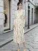 Venta caliente transfronteriza Miyake alta gama sentido volantes vestido midi mujer otoño temperamento estilo suave elegante falda de manga larga