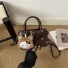 Bolso de Mano de Lunares de Nicho para Mujer 2026 Estilo Nuevo Bolso Tote Versátil de Alta Gama Bolso de Hombro Cruzado Elegante