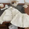 Nuevo Set de Otoño Estilo Coreano para Niñas Estilo Coco Chanel Moda Elegante Chaqueta de Bebé Falda Plisada Conjunto de Dos Piezas Ropa Infantil Transfronteriza