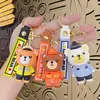 Llaveros de dibujos animados transfronterizos de policía, bombero, policía de tráfico y oso, inodoros y lindos, colgantes para coche y bolso, regalos de figuras