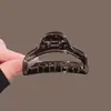 Pinza para el pelo acrílica hueca de diseño único para mujer, nuevo clip de tiburón popular otoño 2026, pinza de garra de peinado de alta gama