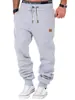2023 nuevos pantalones deportivos de entrenamiento de costura para hombre de otoño e invierno, leggings, pantalones de fitness deportivos para hombre