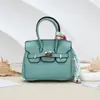 Moda europea y americana mini bolso de platino colgante transfronterizo de alta gama bolsa para auriculares accesorios colgantes llavero de coche monedero al por mayor