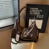Bolso tote de cadena con cordón estilo coreano de gran capacidad para mujer, nuevo 2026, versátil, casual, para el trabajo, suave, de hombro, cruzado