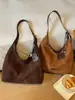 Bolso tote grande de estilo coreano minimalista nuevo 2026, moderno y elegante, adecuado para uso casual y para ir al trabajo, se puede llevar como bolso de hombro o bolso cruzado.