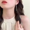 Pendientes de perlas de lujo, sencillos y ligeros, para mujer, diseño de nicho popular, pendientes largos con borlas de alta gama, 2024