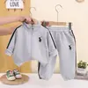 2026 Nuevo Conjunto de Ropa de Otoño para Niños Bebés Niños Primavera Otoño Manga Larga Dos Piezas Niños Bebés Ropa Exterior Guapo Venta al por Mayor