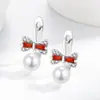 Transmisión en vivo súper ventas nuevos aretes de perla con moño estilo coreano moda personalidad versátiles aretes de perla sintética dropshipping