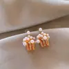 Pendientes geométricos de perlas y circonitas transfronterizos europeos y americanos, pendientes exquisitos de nicho de lujo ligero de alta gama, accesorios para orejas simples y elegantes para mujer