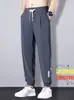 Pantalones deportivos de seda helada para hombre, estilo nuevo 2026, transfronterizos, pantalones atléticos casuales de verano, finos, holgados, estilo jogger, de secado rápido