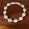 Pulsera de cierre cuadrado colorido tachonada con circonitas, sensación de lujo ligero de nicho de alta gama, joyería dulce y fresca al por mayor