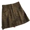 Falda corta de mezclilla camuflaje estilo americano para mujer, nueva primavera/otoño 2026 cintura alta línea A corte ajustado ropa de trabajo falda sexy