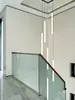 Edifício de villa duplex hall de escada rolante arranha-céu lustre longo design de tira simples moderno lâmpadas de recepção