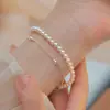 Pulsera de perlas de plata de ley S925 para mujer, pulsera simple y linda con un diseño delicado y lindo, accesorio de joyería de alta gama