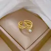 [Galvanoplastia de ouro real] Aberto Fishtail Pearl Moda Micro-incrustado Luz Luxo Anel Comida Anel de Dedo Internet Popular Mesmo Estilo Estilo Frio
