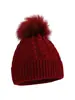 Novos estilos de outono e inverno de gorros infantis de tricô trançado, disponíveis na Amazon para vendas transfronteiriças, em cores sólidas com pompons, proporcionando calor e proteção contra o vento