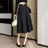 Falda larga para mujer, nuevo estilo otoño 2026, falda de traje de cintura alta con dobladillo amplio, diseño de empalme para ocultar las caderas y crear un efecto adelgazante, falda de longitud media
