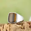 Joias de comércio exterior atacado moda simples pedra preta anel de aço titânio masculino e feminino em estoque atacado