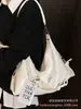 Bolso de Gran Capacidad para Mujer Verano 2025 Nuevo Diseño Nicho Casual Combinable Bolso de Hombro Sobaco Tote para Viaje