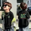 Camiseta de manga larga para niño, estilo falso dos piezas, 100% algodón, nueva temporada primavera y otoño 2026 para niños, camiseta básica de otoño para niños grandes