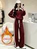 Traje casual de moda deportiva a rayas de bloques de color para mujer, nuevo conjunto de dos piezas de pantalones anchos de corte ajustado para otoño e invierno