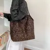 Bolso de Hombro con Estampado de Leopardo en Gamuza para Mujer 2026 Nuevo Retro Nicho Gran Capacidad Trabajo Viaje Individual Hombro Bolso Grande