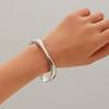 Joyería de mano popular europea y americana transfronteriza, simple, popular y exagerada, hueca de metal primaveral de ala ancha, joyería de pulsera