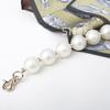 Nueva cadena de cuentas estilo Chanel con perlas artificiales, elegante, de mano. Cadena de cuentas de tela hecha a mano, bolsa de maquillaje de boca dorada para manualidades DIY, cinturón para teléfono móvil