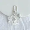 Estrella Hueca de Cinco Puntas Acrílica Campana Hebilla de Puerta de Llave Llavero Cabeza de Bolso Cubierta de Auriculares Colgante Pequeño Decorativo Joyería Colorido