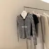 Contiene Tencel + Lino, Trece Líneas Imis* En Stock Suéter de Punto de Manga Larga Ajustado Cuello Redondo Otoño 2026