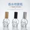 Venta al por mayor del fabricante Varios colores de Botellas de Perfume de 30 ml con Forma de Calavera, Botellas de Cáñamo, Botellas Pequeñas para Aceites Esenciales y Botellas de Vidrio para Manualidades