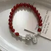 Pulsera con Colgante Flor de Ágata Roja Bendición para Mujer, Regalo de Nicho de Alta Gama para Mejores Amigas, Joyería de Mano Estilo Chino Nuevo