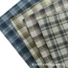 En stock nuevo 2027 teñido en hilo primavera verano otoño tela a cuadros de algodón lavado ropa camisa de comercio exterior tela a cuadros