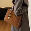 Bolsa Tote Grande Estampa de Leopardo Feminina 2026 Nova Tendência Versátil para o Trabalho Bolsa de Ombro Único Bolsa de Mão de Nicho Feminina