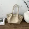 Bolso tipo cubo de alta gama, simple y versátil para mujer, Nuevo de tendencia estilo coreano Primavera Temprana 2026 Bolso de mano y bolso de hombro exquisito y elegante