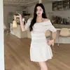 Conjunto Estilo Deseo Puro Transfronterizo: Conjunto de Dos Piezas para Mujer en Verano: Top de Punto con Hombros Descubiertos y Cintura Ceñida y Falda Plisada de Cintura Alta