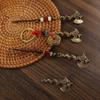 Llavero de latón con colgante para bolso de pareja, adornos de cobre puro, hacha Panlong, llave de coche, pequeños accesorios, productos pequeños de Yiwu