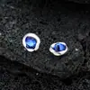 Pendientes de clip magnéticos Mobius de circón azul, un accesorio elegante y sofisticado para hombres, que ofrece un look único y moderno.