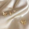 Pendientes pequeños con forma de mariposa de diamante para mujer, modernos y elegantes, con clip para la oreja, de estilo frío y popular en Internet.