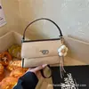 Nuevo Bolso Cuadrado Estilo Francés 2026 Bolso Nuevo Modelo Transfronterizo Elegante Bolso de Hombro Bolso de Mano de Lujo Ligero para Viajes