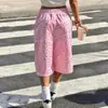 Pantalones cortos deportivos casuales de estilo americano Y2K en color rosa dopamina con estampado de leopardo, cordón, pierna ancha y longitud media, dulces y geniales, corte holgado y con caída.