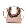 Colección de principios de otoño 2026 transfronteriza: bolso de mano infantil de lunares, moderno y versátil, bolso de hombro de encaje a la moda, bolso cruzado elegante