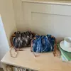 Bolsa Saco com Cordão de Corrente Simples Moda Transfronteiriça para Mulheres 2026 Novo Estilo Coreano Nicho Elegante Bolsa de Ombro Transversal