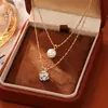 Colar de Pérolas Empilhadas de Camada Dupla na Moda com Toque de Alto Padrão, Luxo Leve, Temperamento Elegante, Banhado a Cobre com Ouro Real, Corrente Tendência para Clavícula