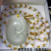Nuevo jade blanco claro lujo ligero imitación bola de mármol blanco colgante de jade unicornio de doble cara valiente fábrica directa para transmisión en vivo